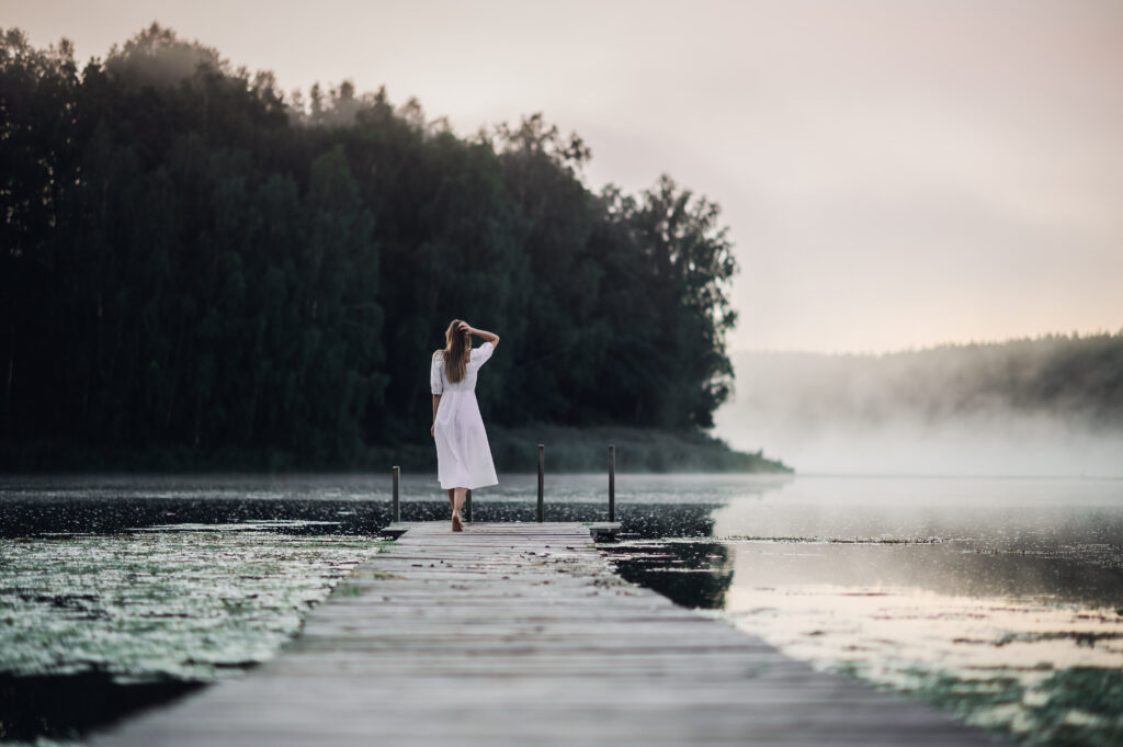 woman in white light dress run on the pier on fogg 2023 11 27 04 57 08 utc Gender-specific treatment programs Gender-specific treatment programs,women's addiction treatment,specialized addiction recovery