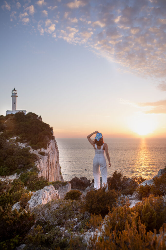 A woman overlooking a sunrise, symbolizing reclaiming your identity after addiction.