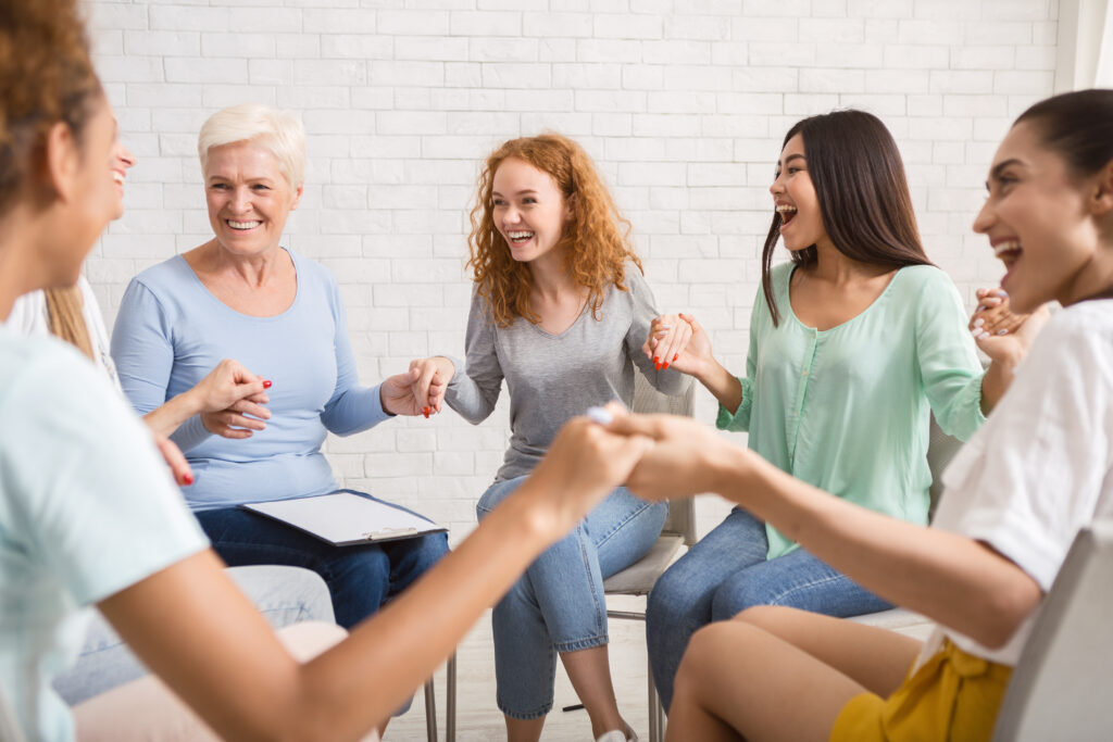 smiling diverse women sitting in circle during gro 2023 11 27 05 30 16 utc reclaim your identity reclaim your identity
