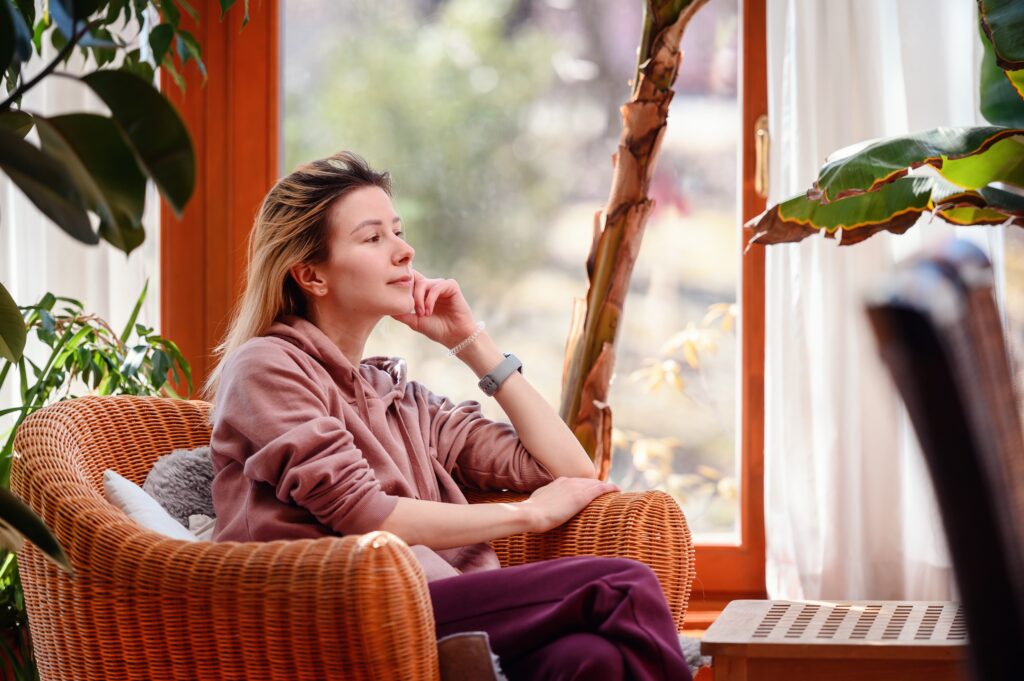 Woman finding calm and clarity in therapy as part of women’s burnout recovery