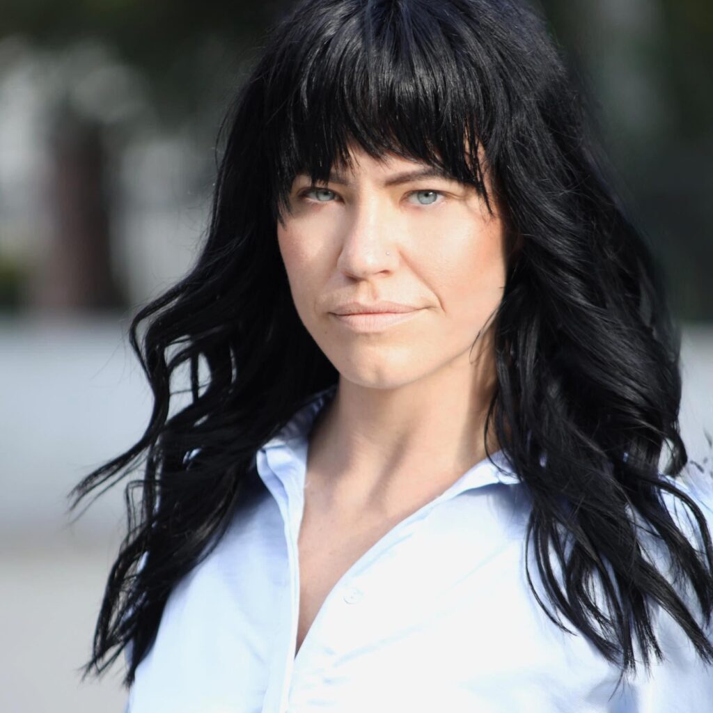 Rachel Kove, certified recovery coach, podcast host, and mental health advocate.